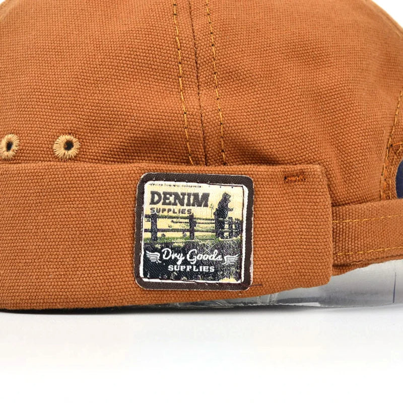 Grant - Casquette décontractée à visière roulée